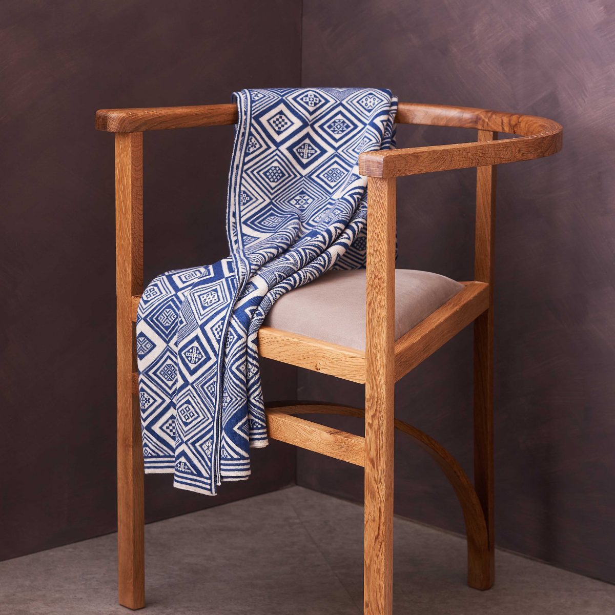  Blue and White throw by BAKKA drapped over prism chair by Angus Ross.